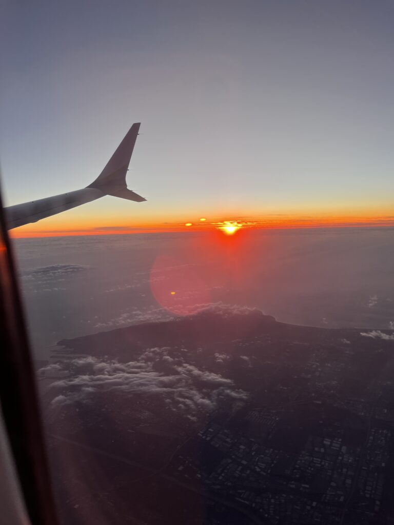 Sunset from an airplane window.