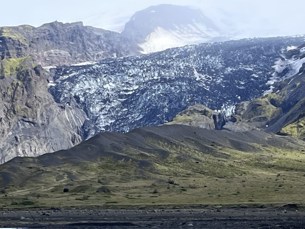 A mixture of glacial ice and volcanic ash in the mountains of Thorsmork, Iceland.