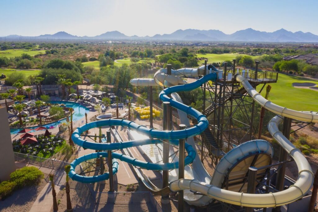 Twisting waterslides with Camelback mountain in the background.